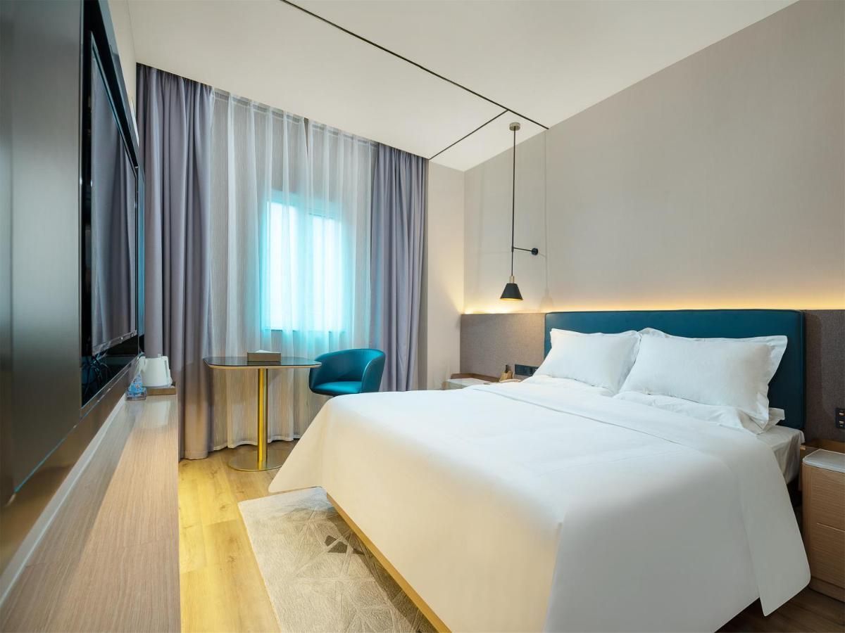 Chaoman Hotel -Guangzhou Shijing City Plaza Xiaoping Subway Station Exterior photo
