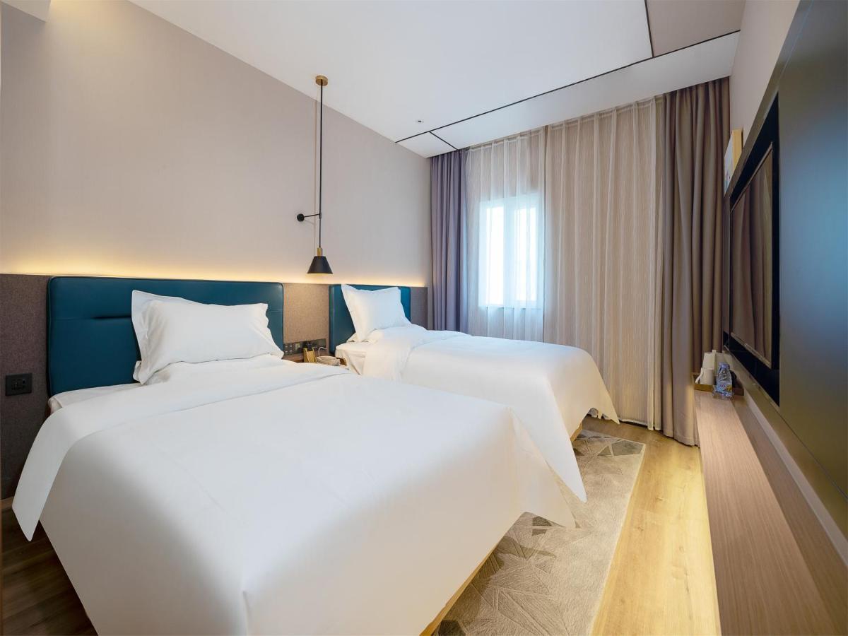 Chaoman Hotel -Guangzhou Shijing City Plaza Xiaoping Subway Station Exterior photo