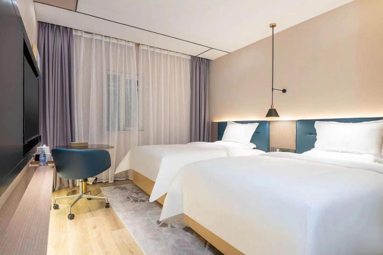 Chaoman Hotel -Guangzhou Shijing City Plaza Xiaoping Subway Station Exterior photo